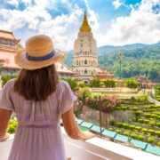 Female tourist visiting Kek Lok Si Temple in Penang